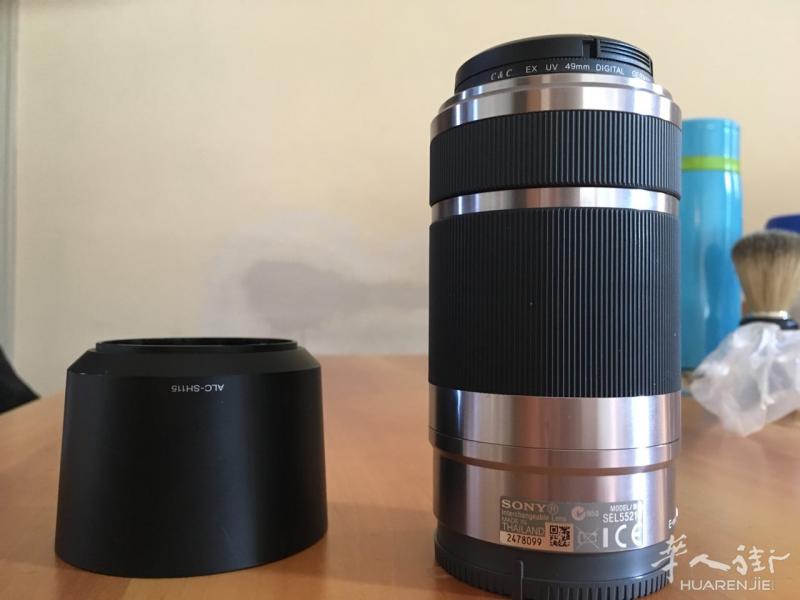 超低价出售SONY摄像机镜头一个，型号是SEL55210，九成新，有意者请与我联系。