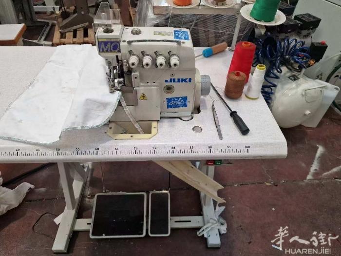王师傅缝纫机店出售二手4线打边机，联系电话3332662792