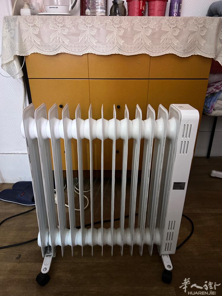 本人因回国低价出售电暧器电风扇有需要可联系我电话0753970466