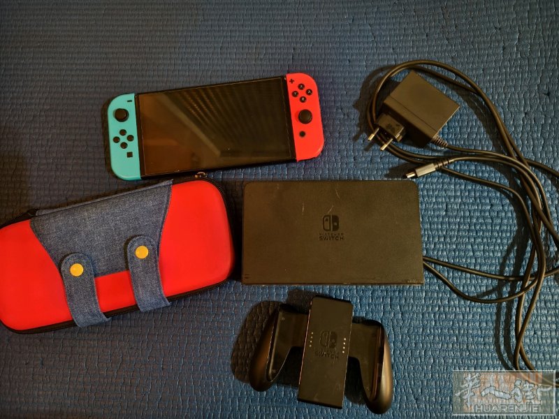 出一个闲置游戏机switch oled,送运输包和一张MicroSD128gb内